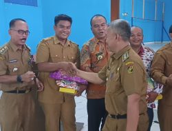 Camat Kampar Kiri Lakukan Sertijab Pj Kepala Desa