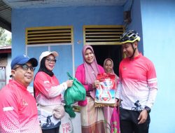 Bupati dan Wakil Bupati Kampar Salurkan Bantuan Beras dan Sembako Sambut Ramadhan Bersama Komunitas Sepeda Kampar