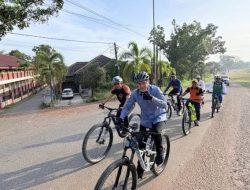 Bupati Kampar Pimpin Gerakan Jumat Bersepeda dan Sepeda Motor ke Kantor, Dorong Efisiensi Energi dan Transformasi WFH